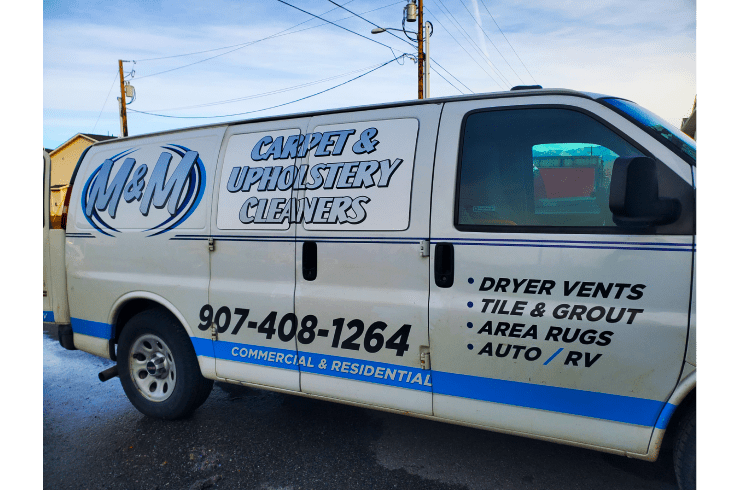 M&M Carpet Cleaners technician working on a carpet
